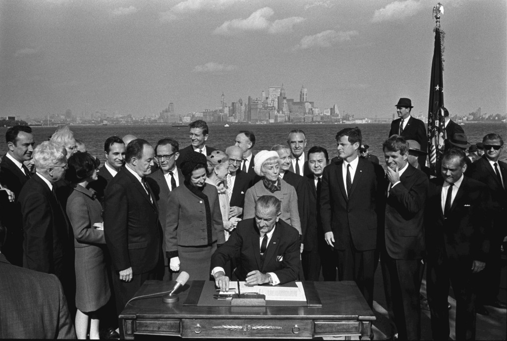 President Lyndon B. Johnson signing the Immigration and Nationality Act, 1965