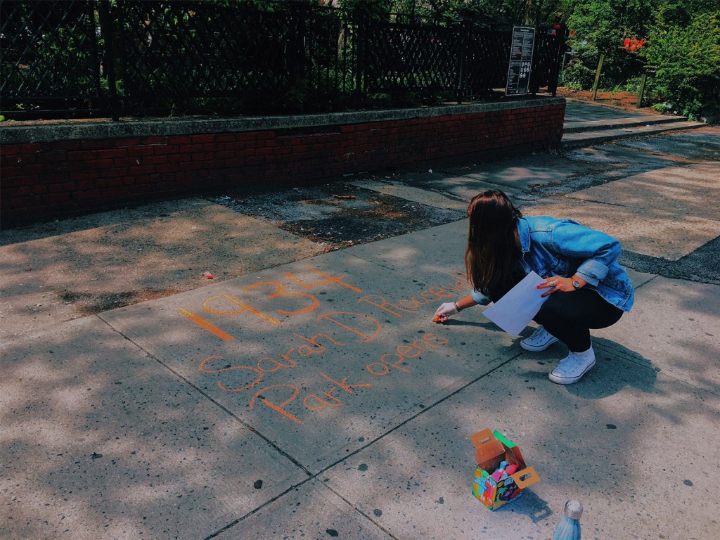 Melanie, who works for the Lowline, chalking outside Sara D. Roosevelt Park